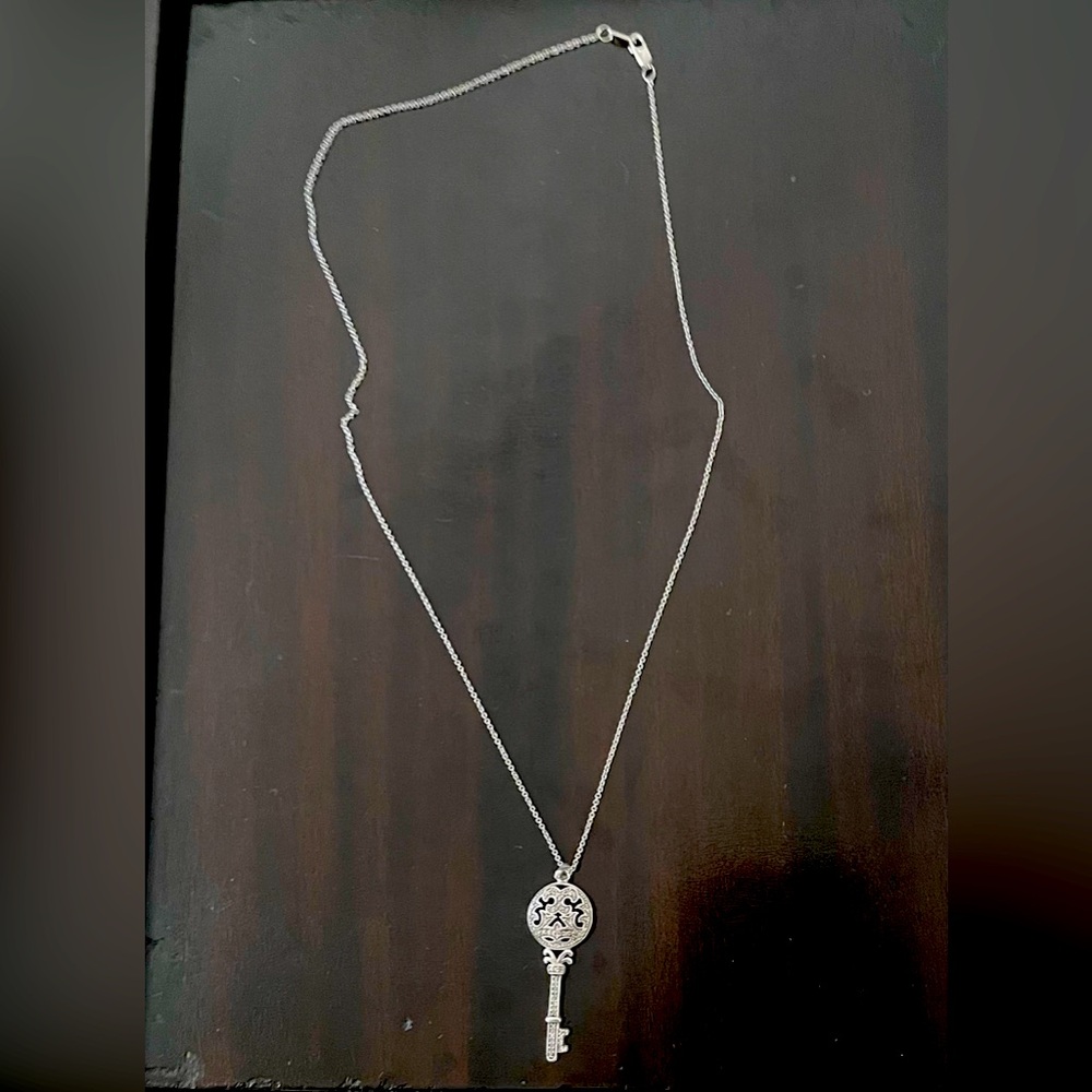 Sterling Silver Necklace with Key Shaped Diamond Pendant. 18 inch chain.